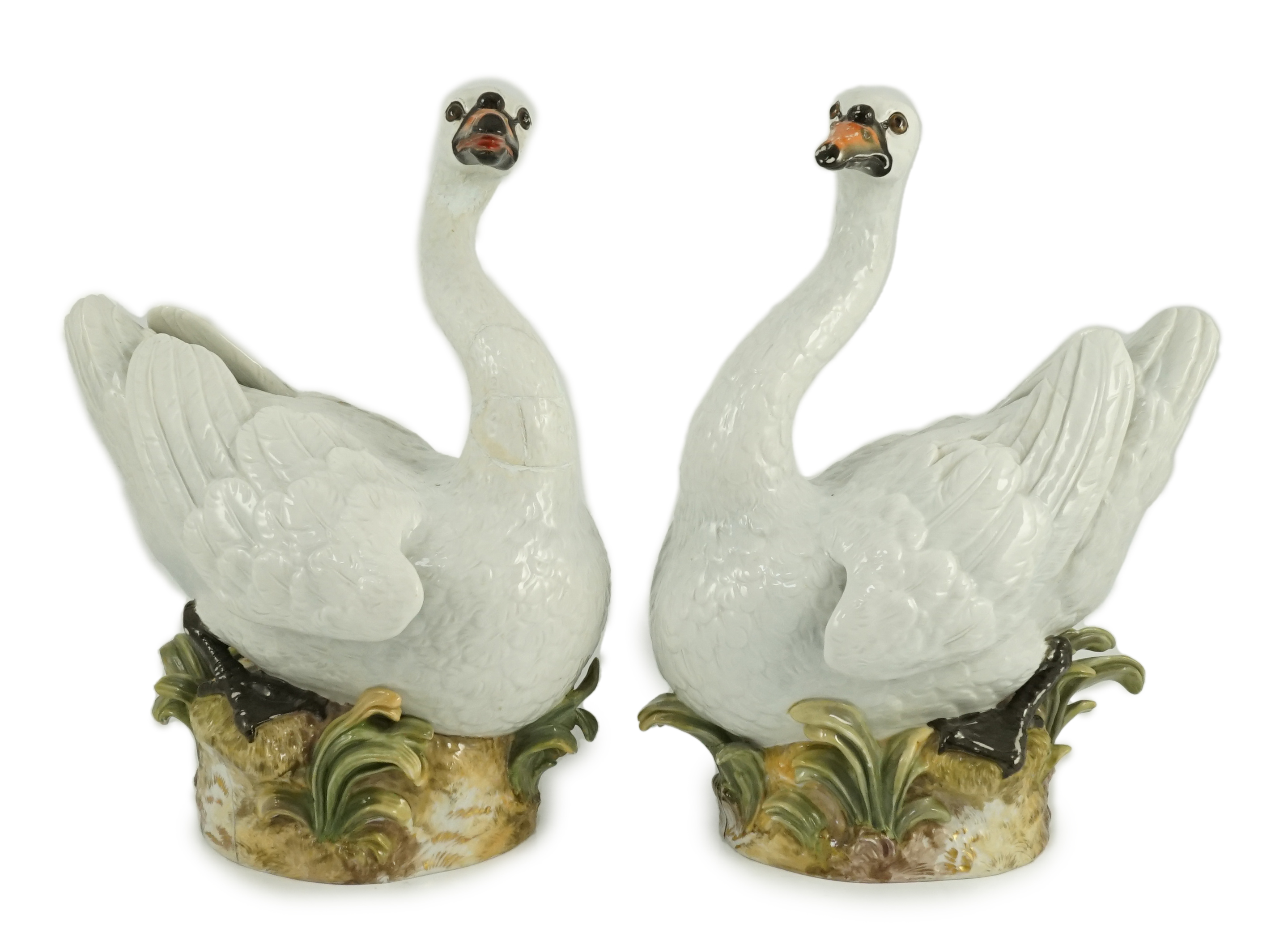 A pair of large Meissen models of swans, 19th century, one neck restored